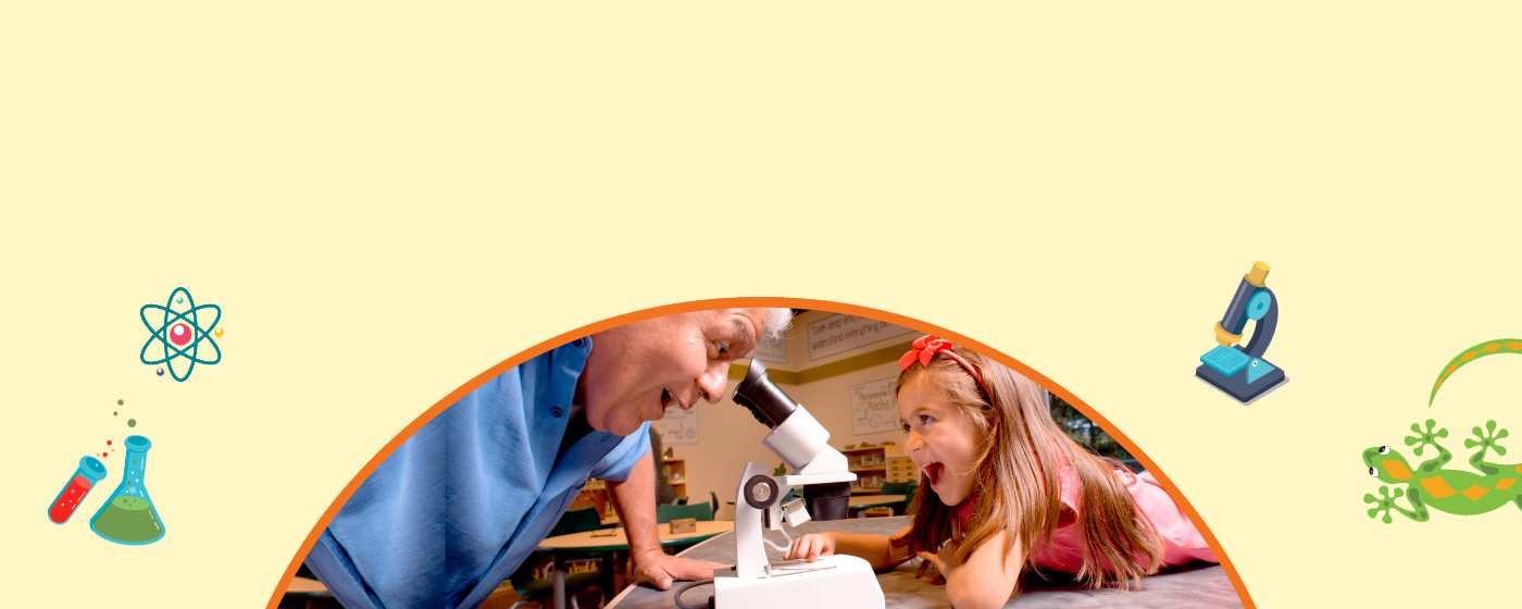 Grandfather and granddaughter explore natural science
