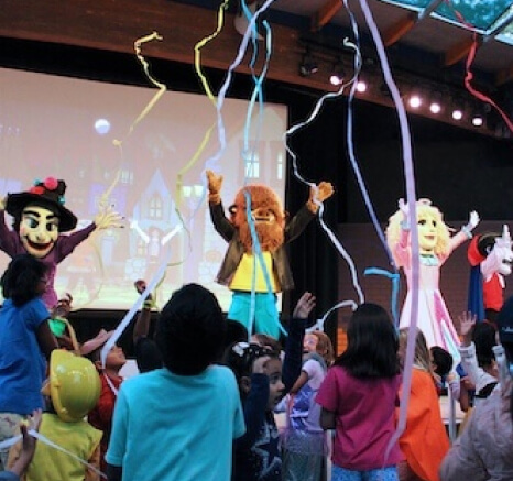 Vinnie the Vampire, Wolfgang Werewolf, Princess and Wendella the Witch dancing after saving Halloween.